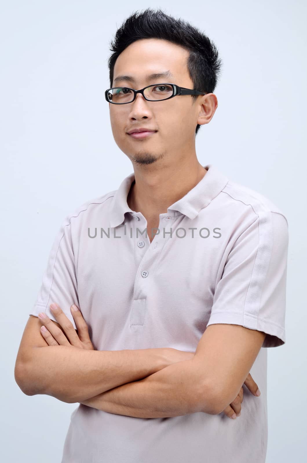 Casual Asian man arms crossed by szefei