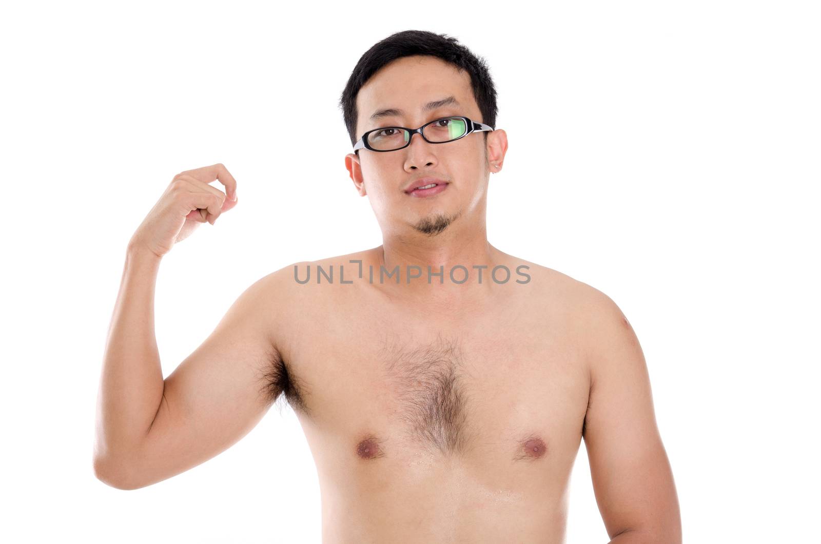 Portrait of shirtless Asian man showing his muscle, standing isolated on white background.