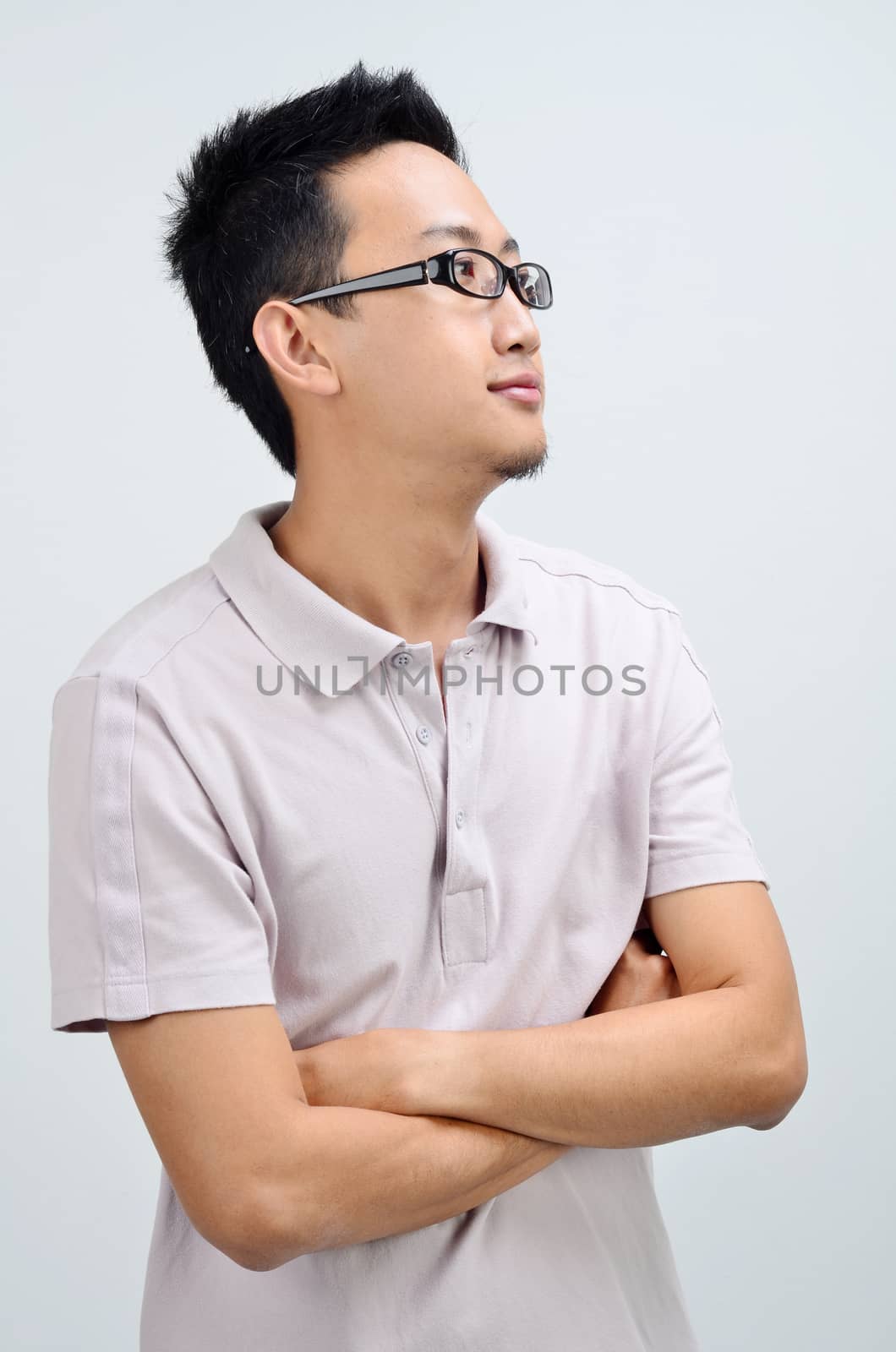 Portrait of casual Asian man looking side by szefei