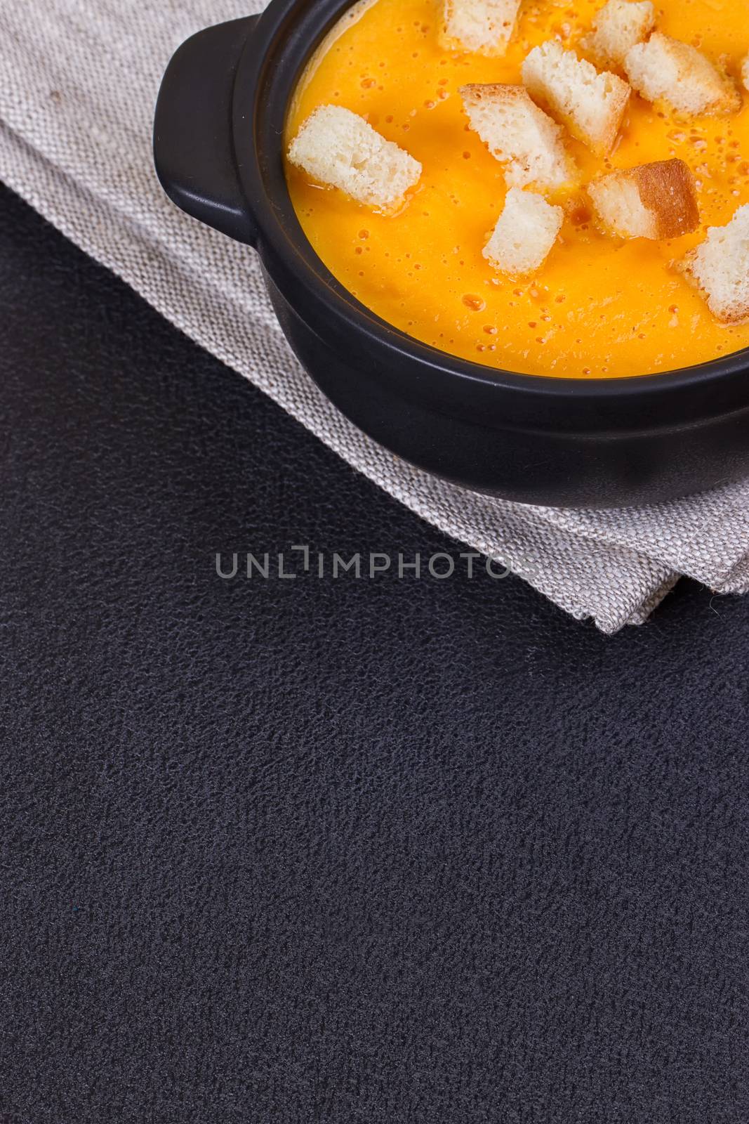 Pumpkin and carrot soup with cream and parsley by victosha