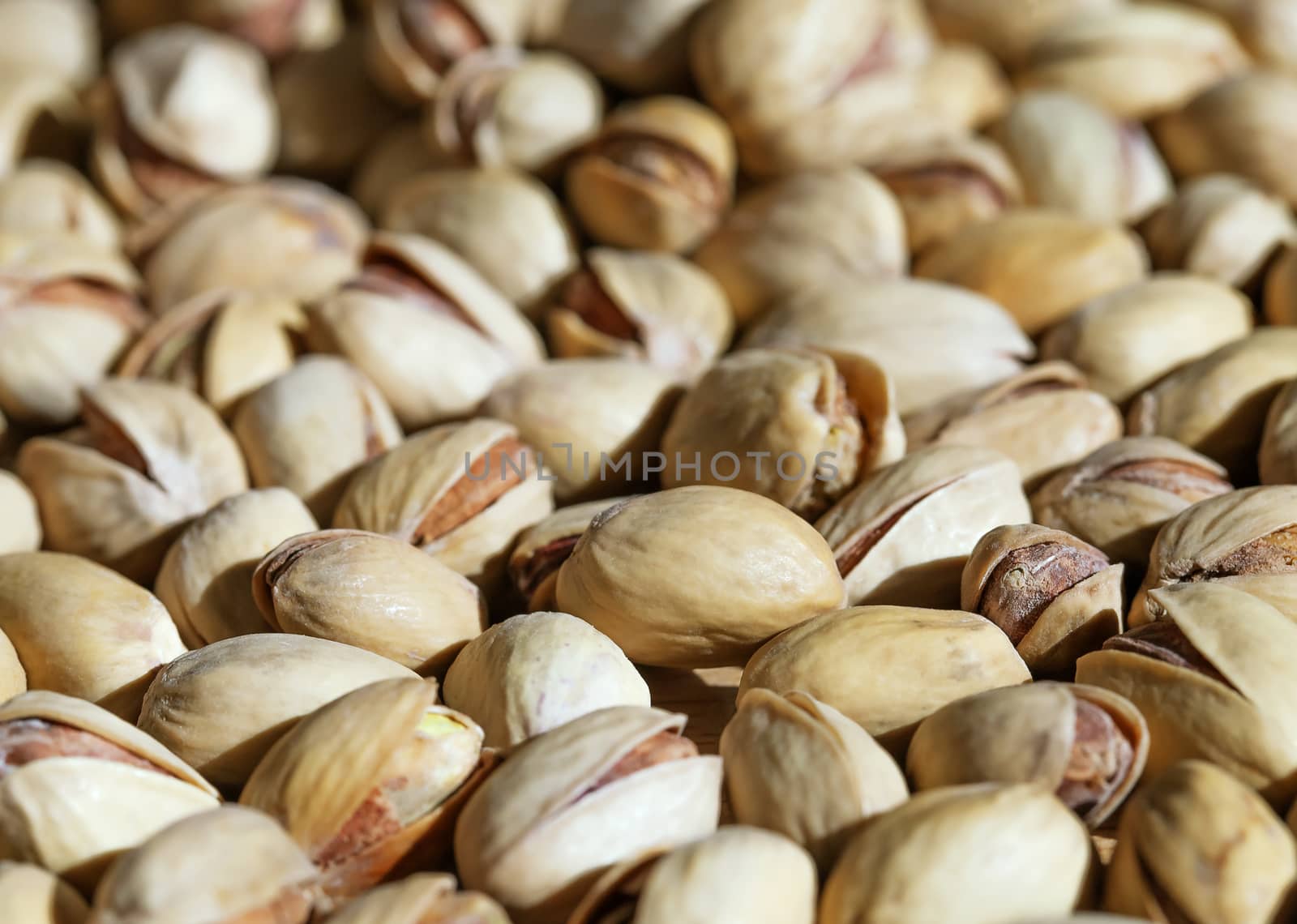 Close up of fresh pistashio nuts, background