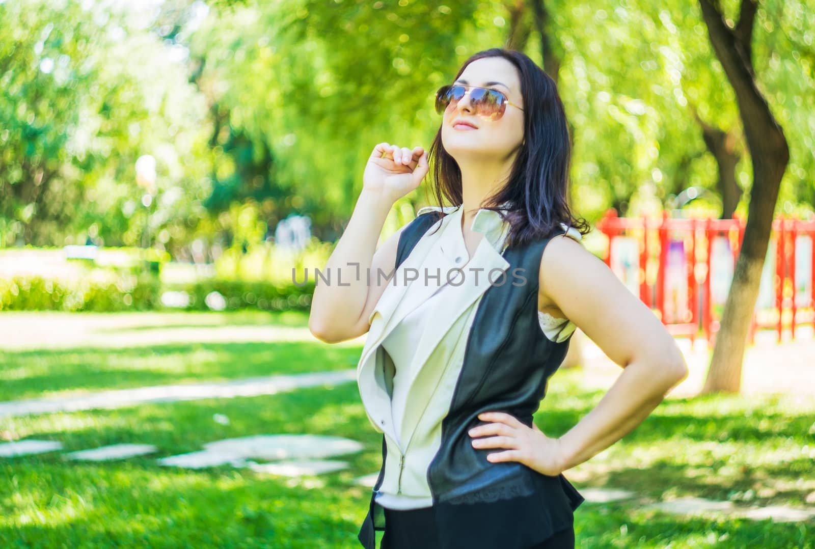 business woman in the park by Desperada