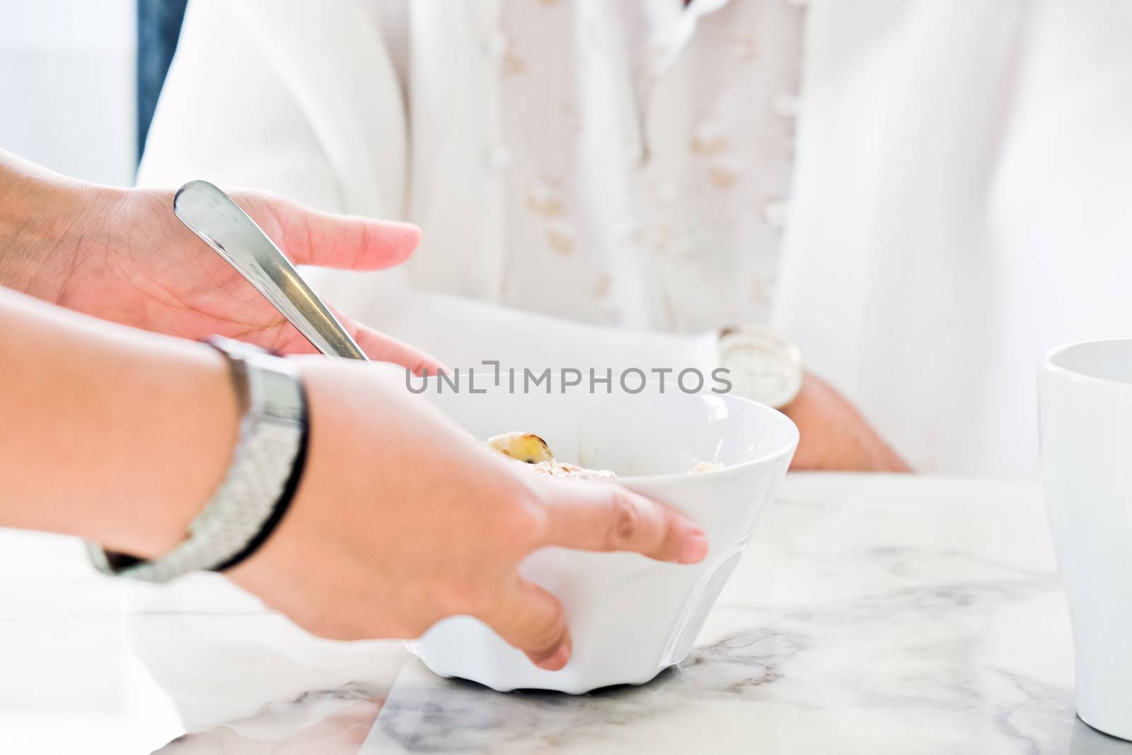 carer bringing meal to senior,meal time. part of senior woman with breakfast, Senior healthy eating