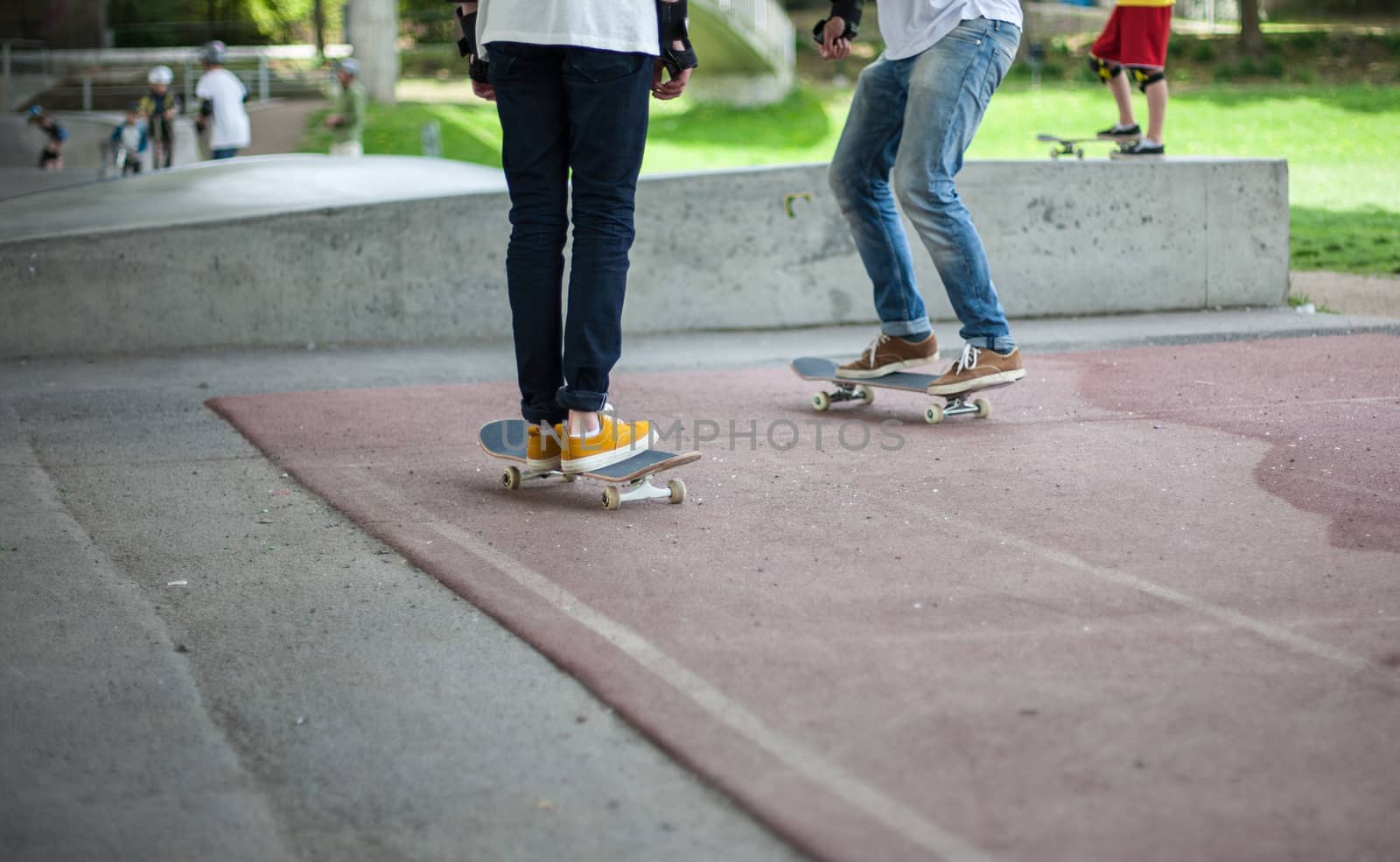 Powerful funny young guys are trained in a skate park Stockholm, Sweden. Leisure, playing, trick