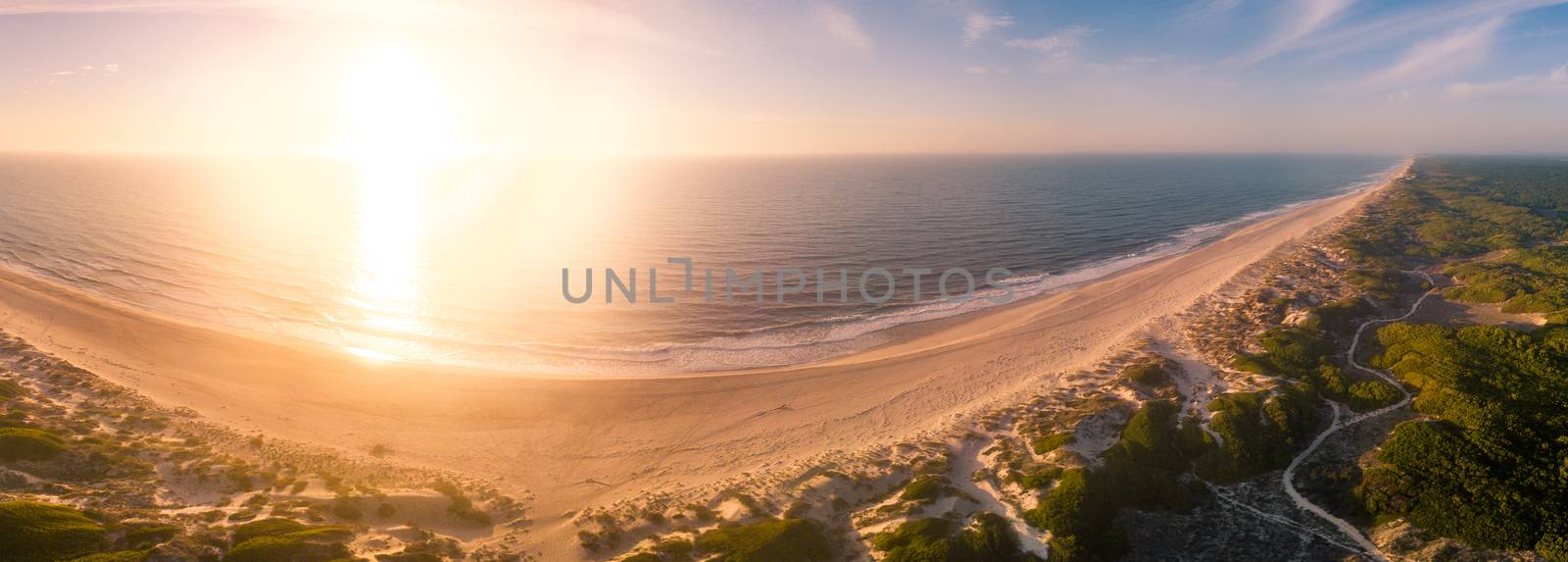 Aerial view of beach at sunset by homydesign