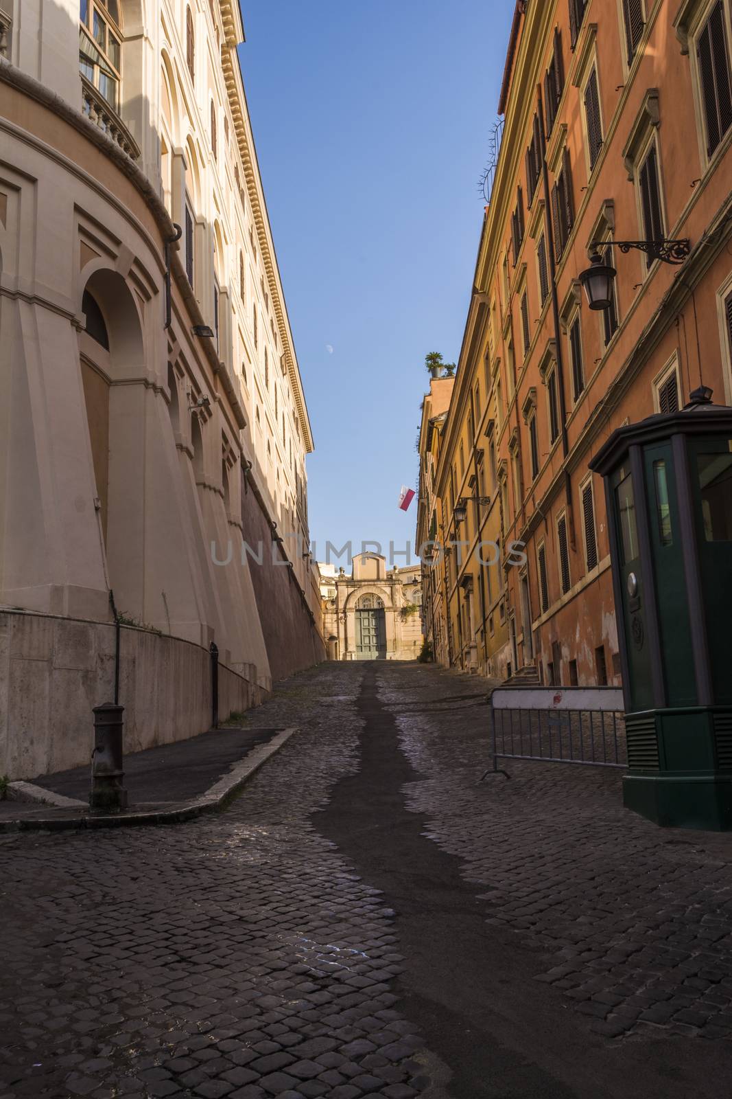 An empty paved street in Rome, Italy.