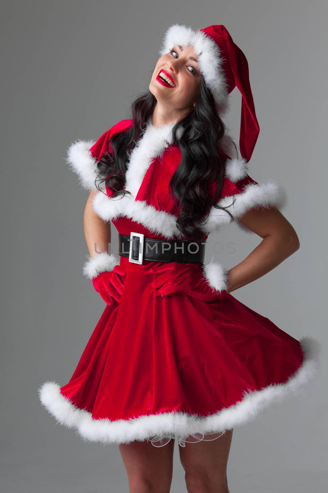 Portrait of beautiful sexy girl wearing santa claus clothes