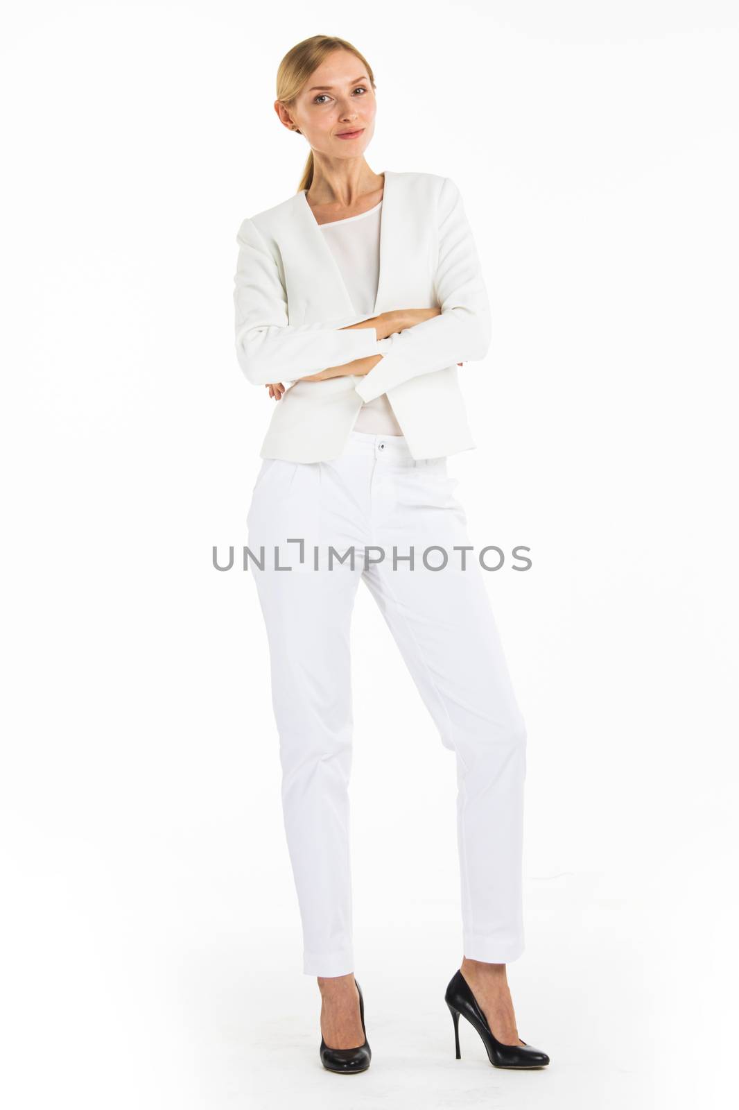 Portrait of mature smiling business woman in white suit isolated on white background