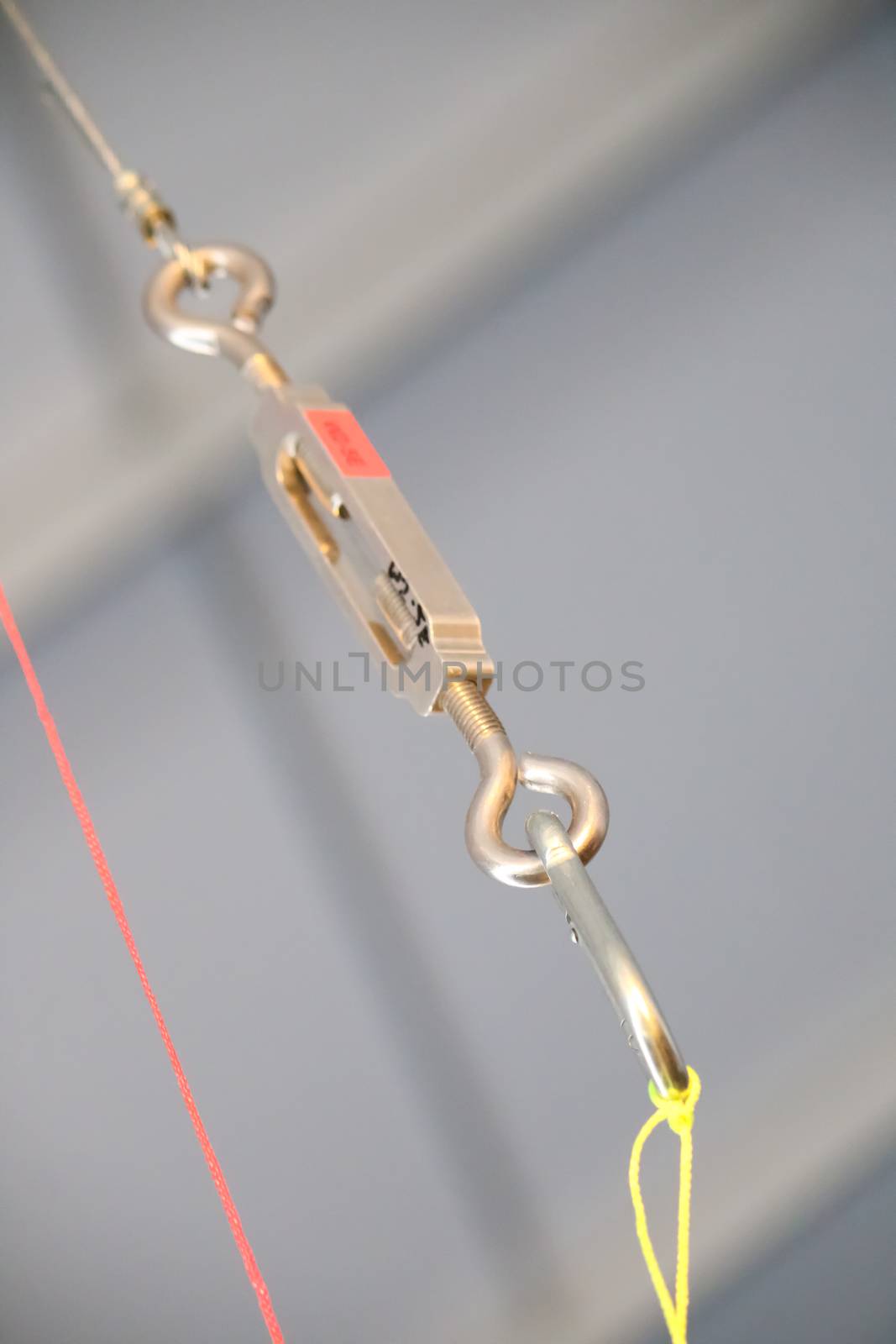 Cables and hook hanging from the Ceiling at the Construction site