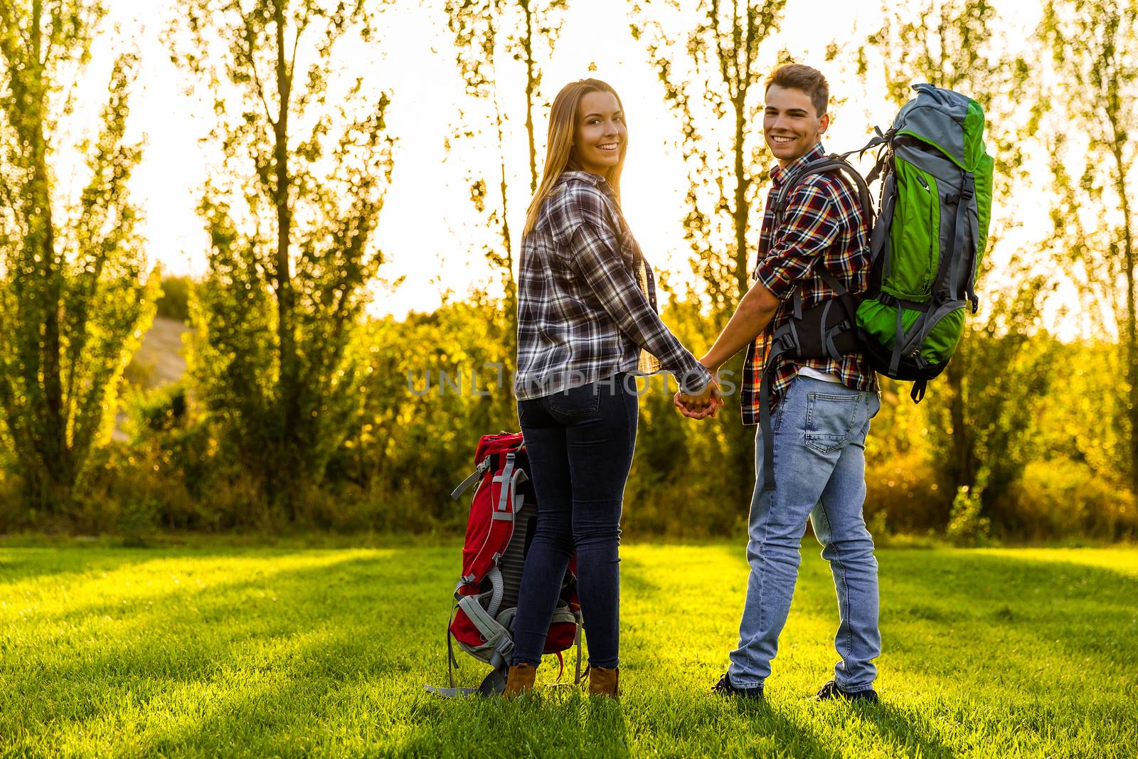 Shot of a young couple with backpacks ready for camping