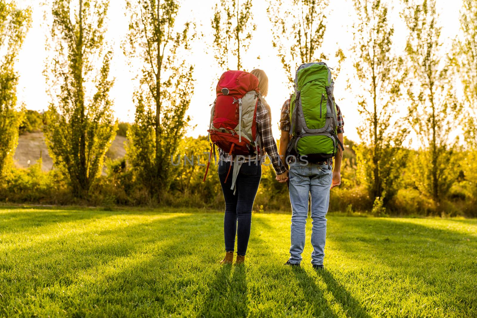Shot of a young couple with backpacks ready for camping