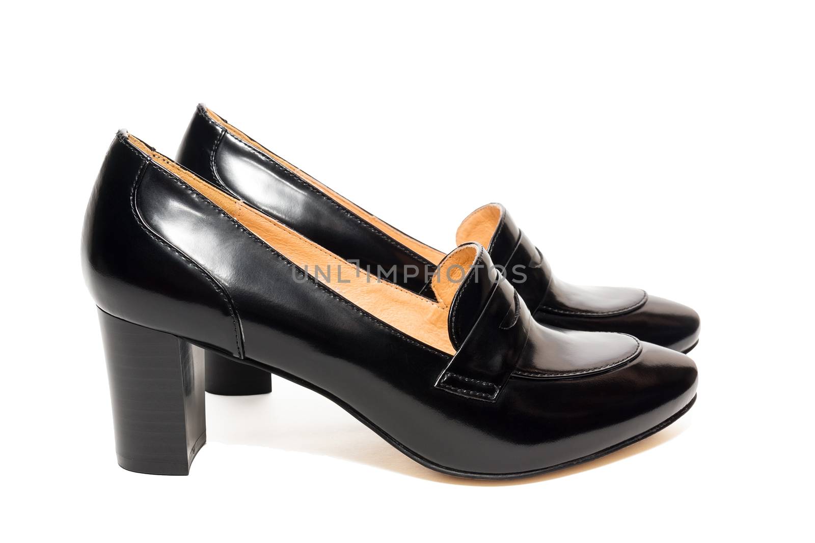 Black female shoes on a white background, isolated, studio