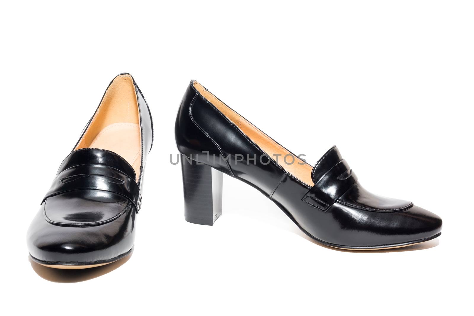 Black female shoes on a white background, isolated, studio