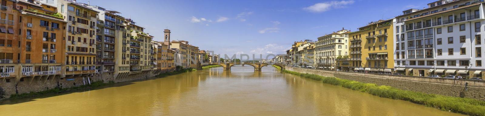 Panoramic view of Arno river and old bridge by day, Florence or Firenze, Italia