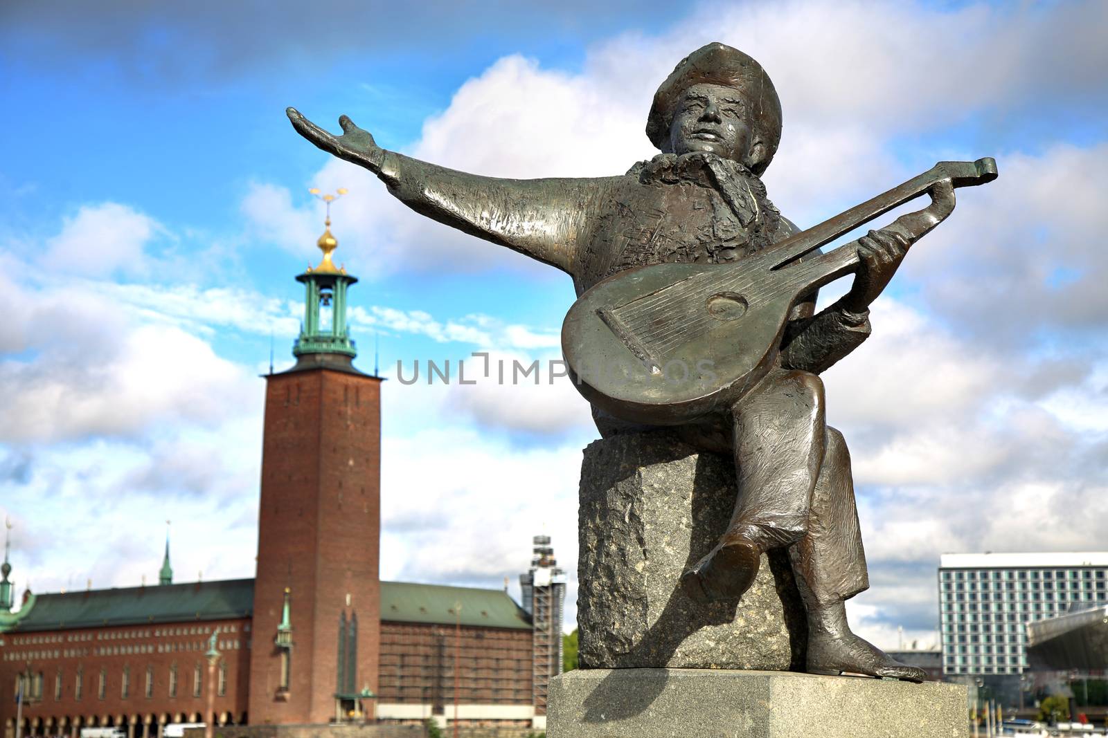 Evert Taube monument on Gamla and City Hall Stan in Stockholm, S by vladacanon