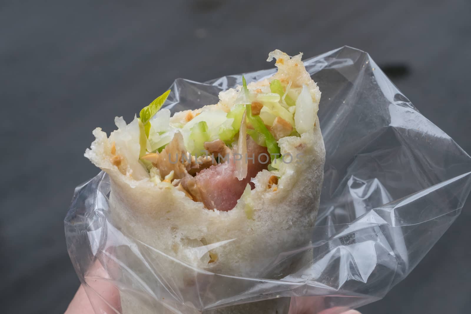 The close up of delicious Taiwan spring roll at food street market in Taipei, Taiwan.