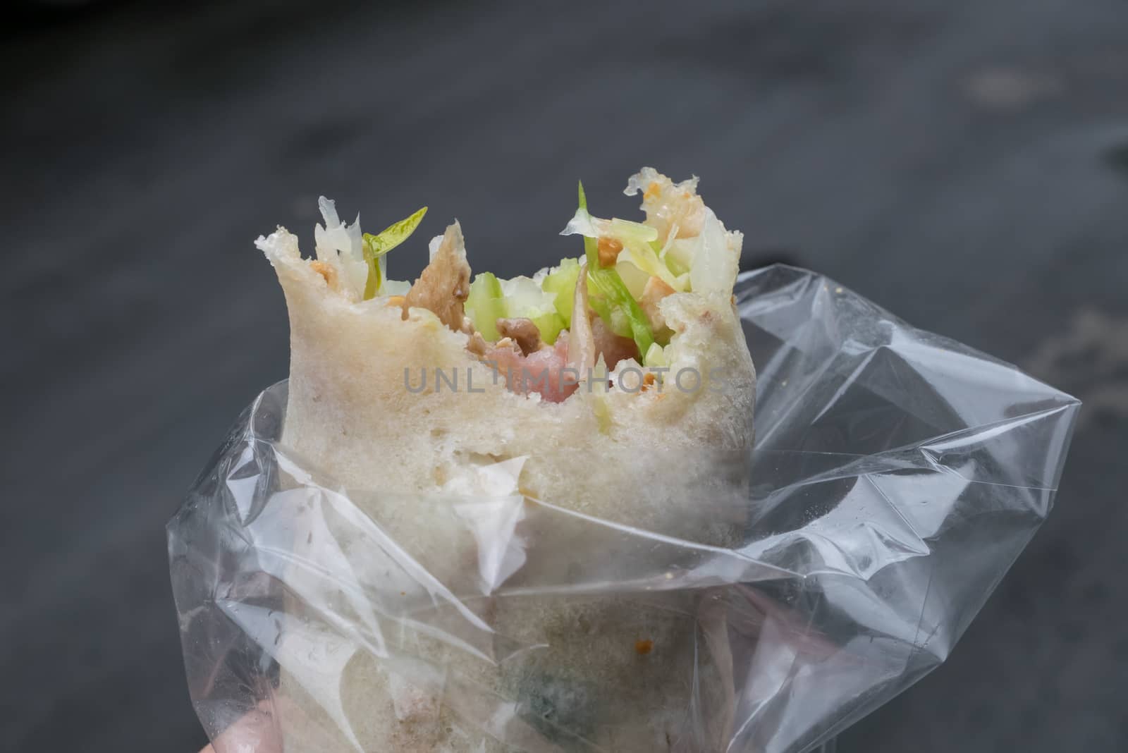 The close up of delicious Taiwan spring roll at food street market in Taipei, Taiwan.