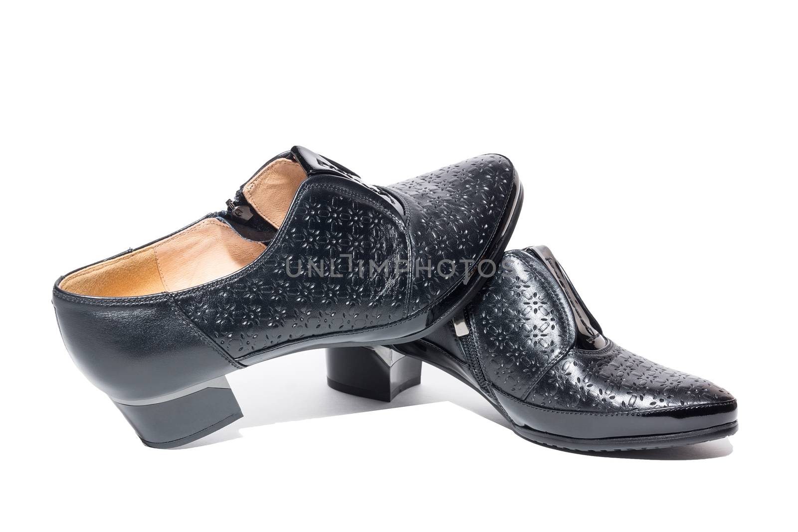 Black female shoes on a white background, isolated, studio