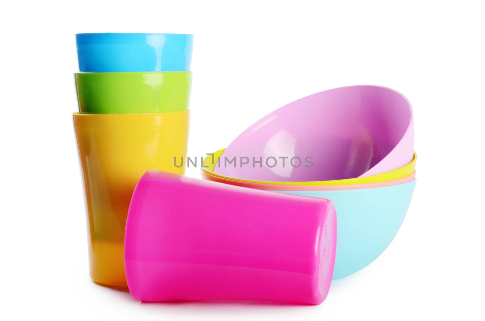 Plastic cups and plates isolated on white