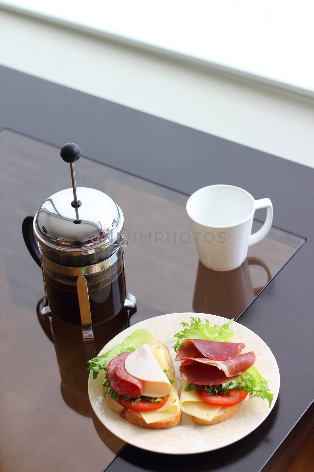 Healthy breakfast with sandwiches and coffee in french press, scandinavian style