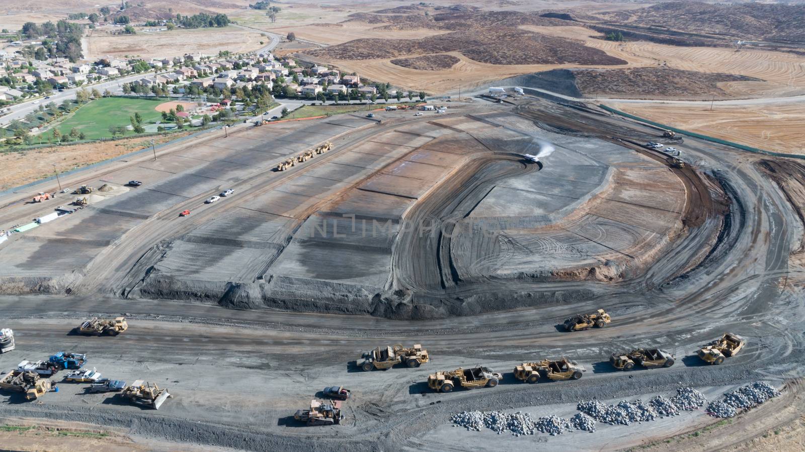 Aerial View Of Tractors On A Housing Development Construction Site.