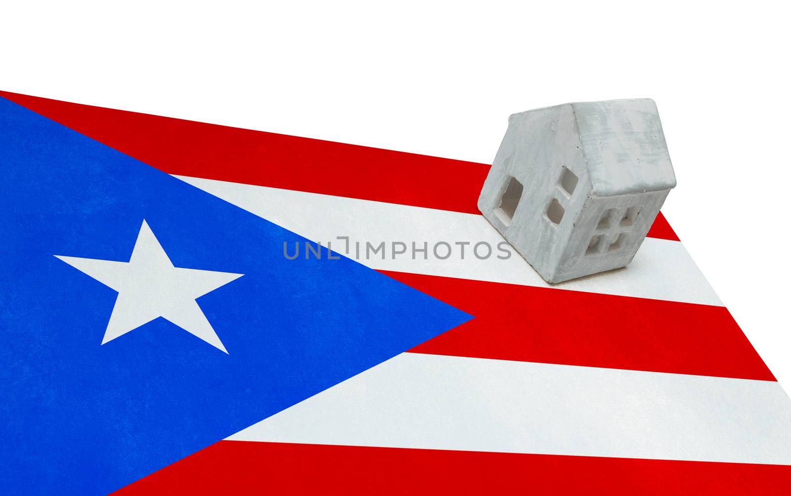 Small house on a flag - Puerto Rico by michaklootwijk