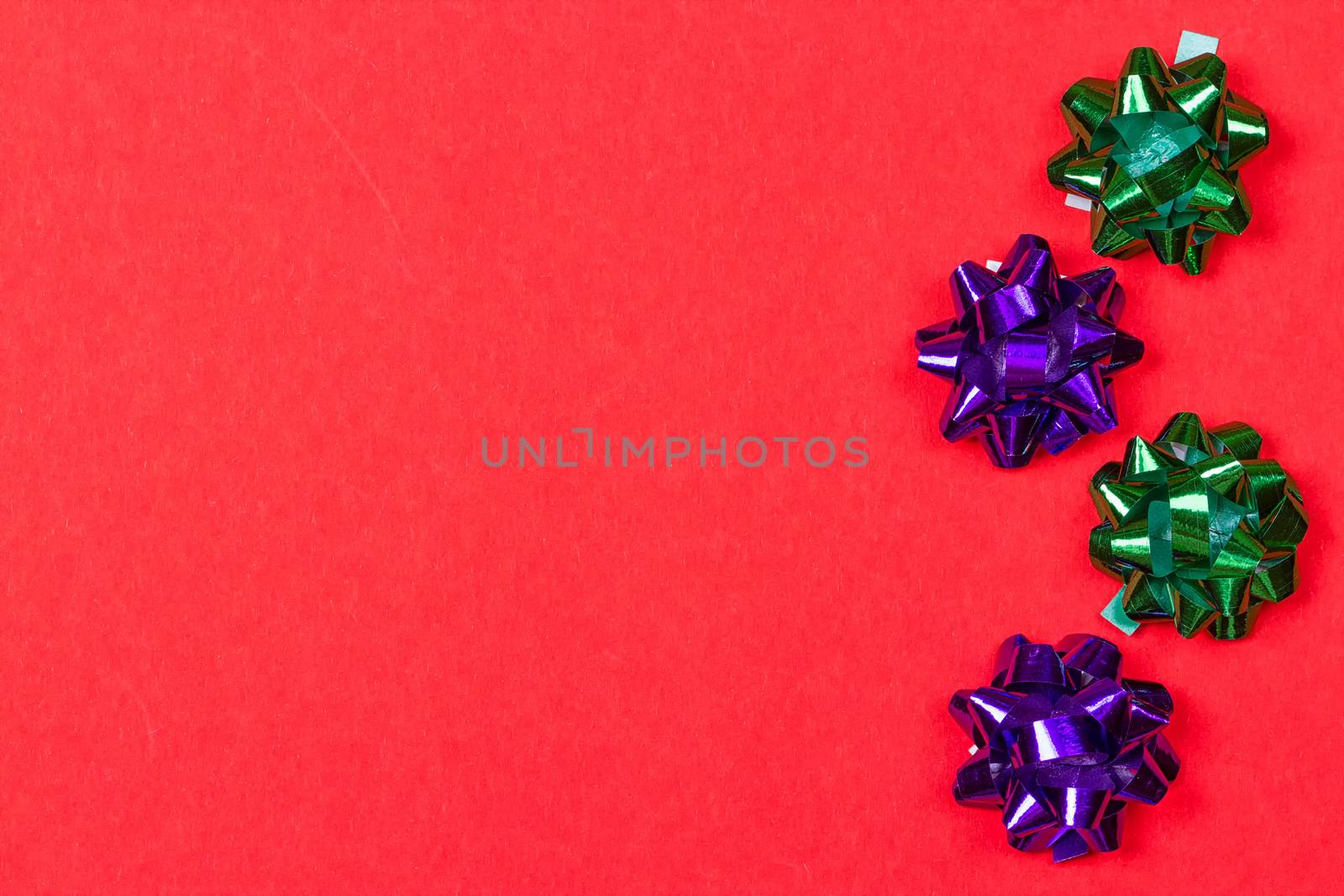 Bows for anniversary decoration on red background