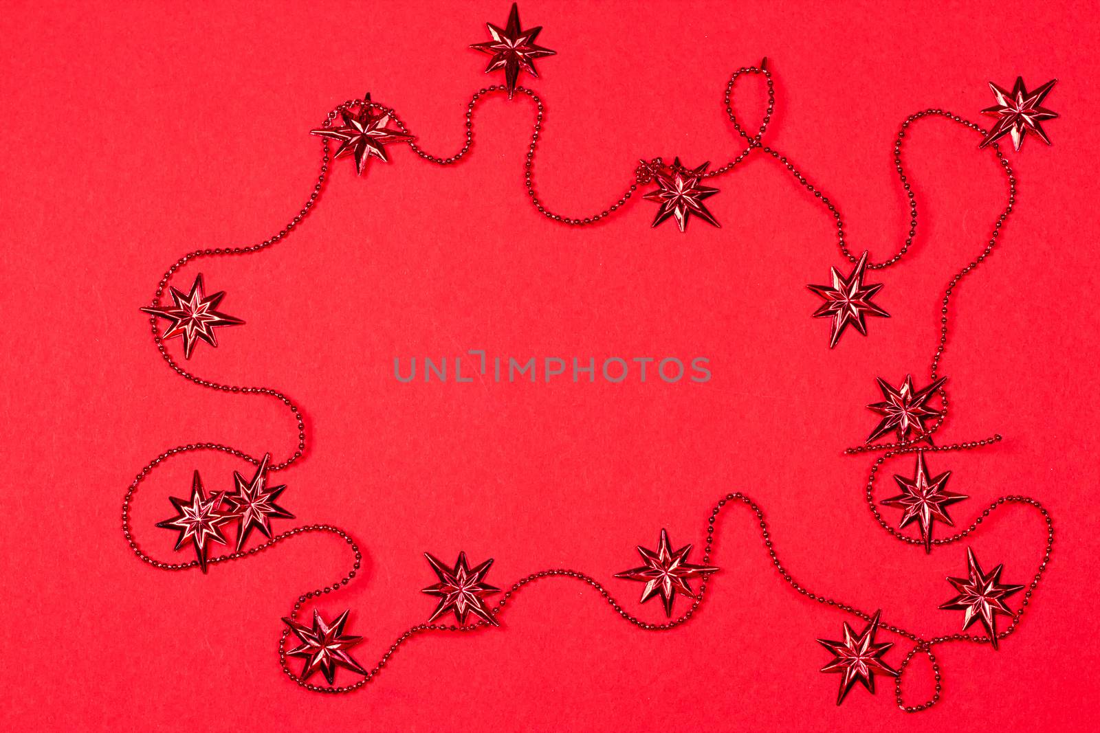 decorative festive garland on a red background