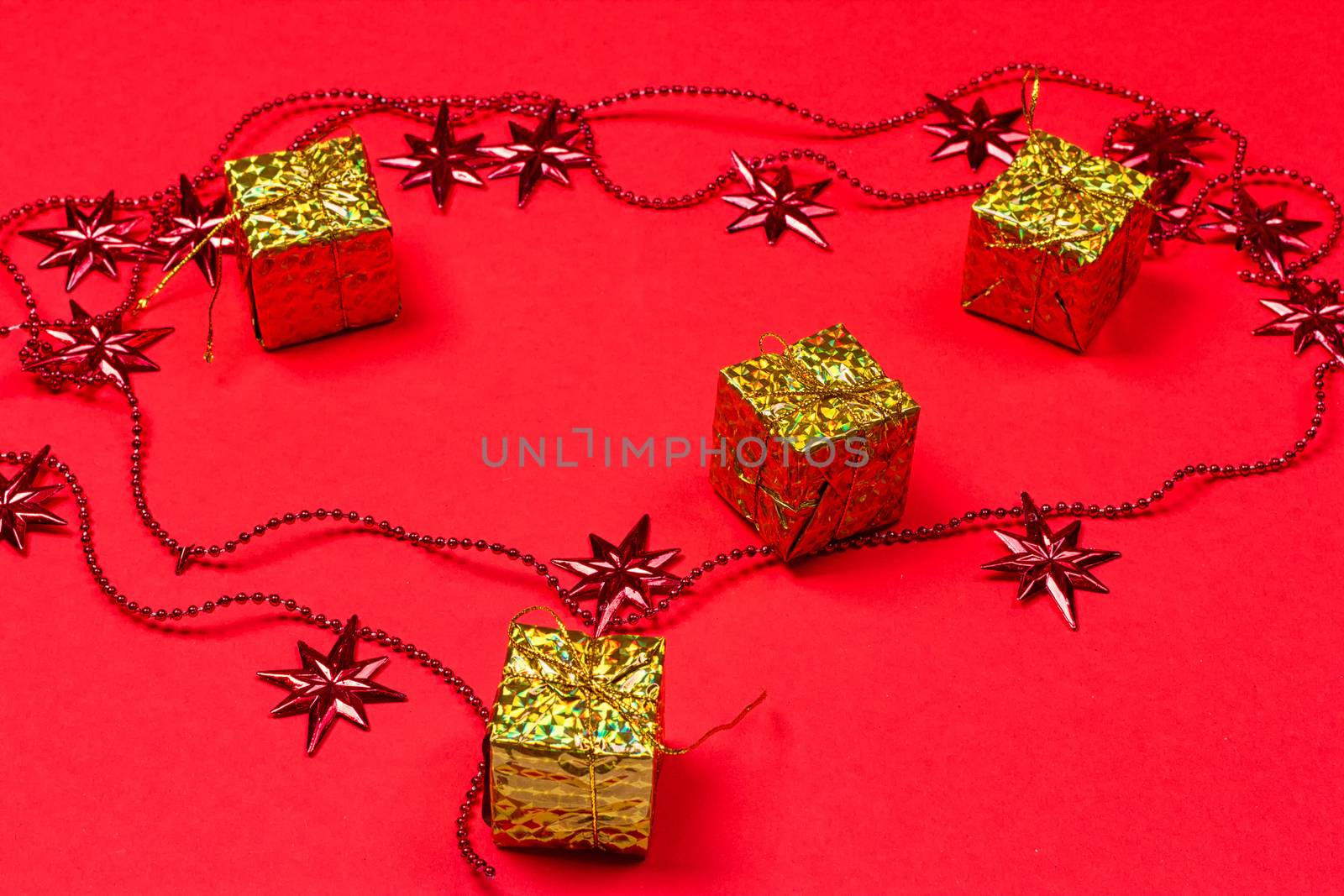 Christmas red background with gift and decoration by victosha