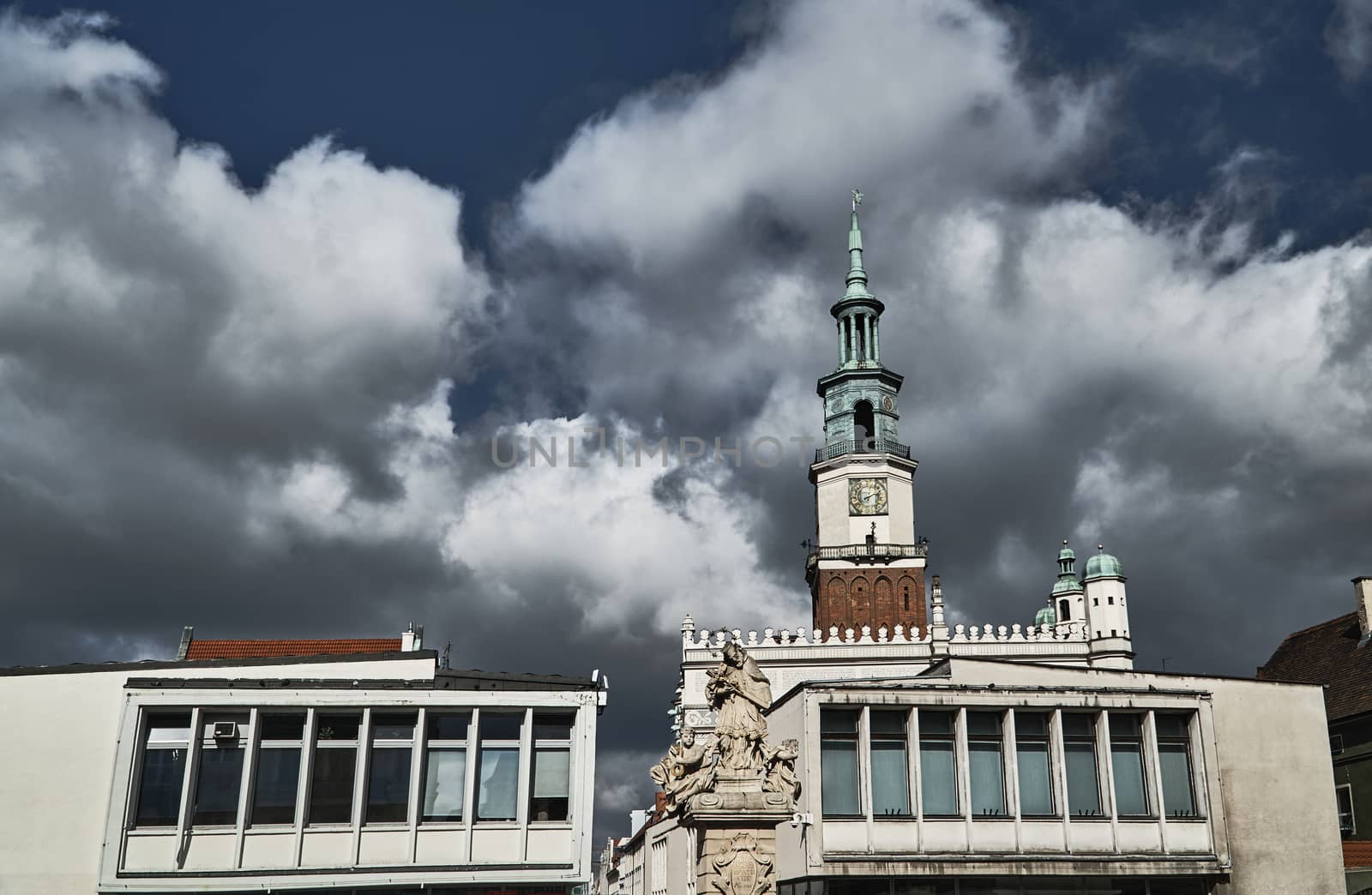 Monument, townhouses and town hall at the Old Market in Poznan