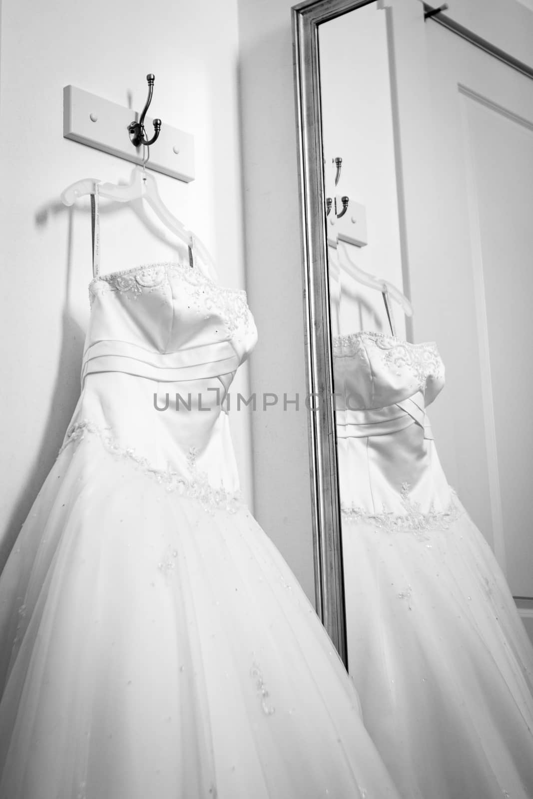 Black and white wedding dress reflected in a mirror. by salejandro