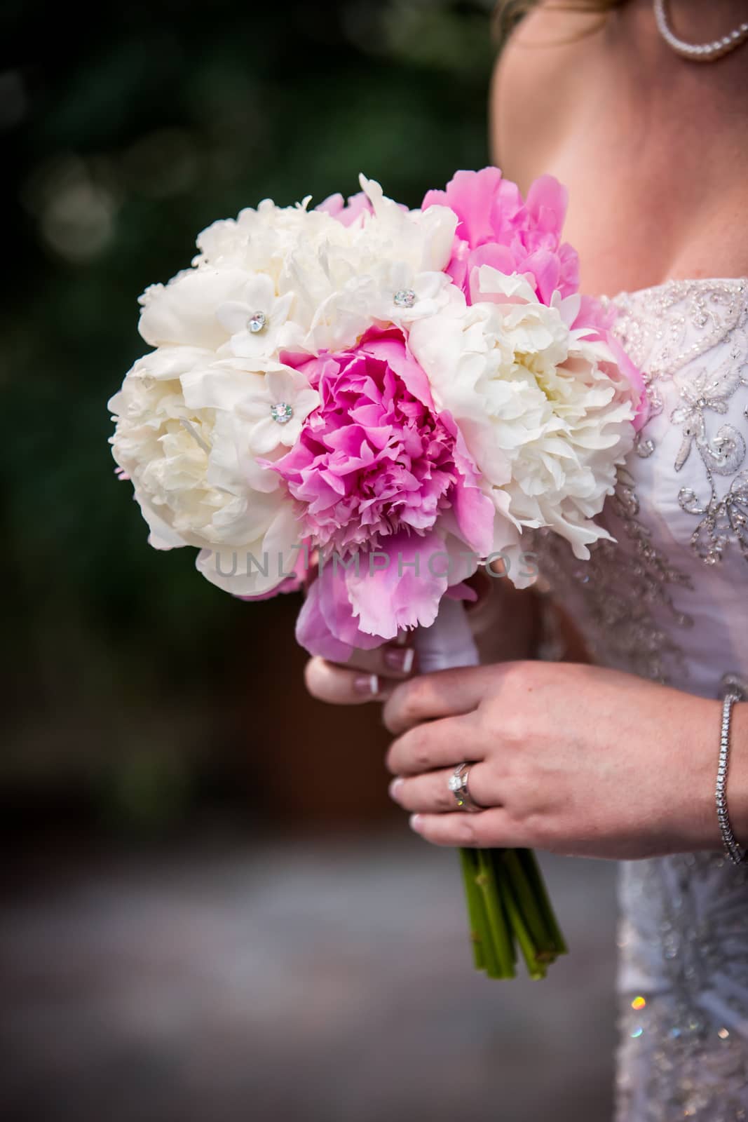 Beautiful White & Pink Bouquet Held by Wedding by salejandro