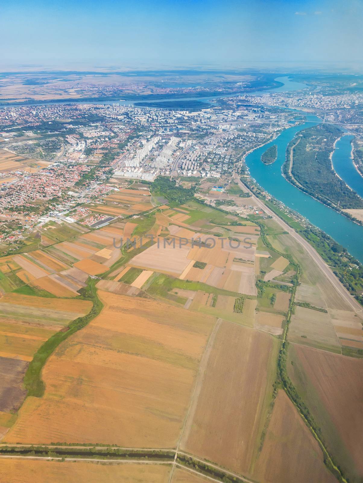 Bird-eye view on Belgrade, Serbia, with rivers Sava and Danube, on a sunny day. The part visible on the image is called Novi Beograd (New Belgrade).