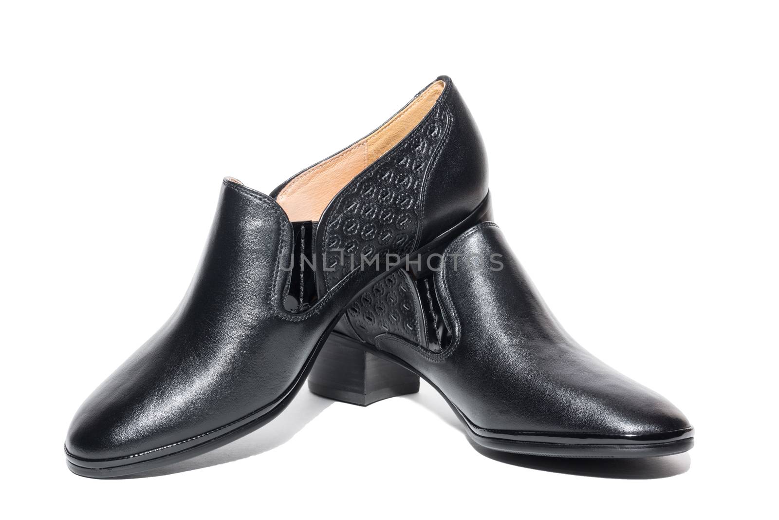 Black female shoes on a white background, isolated, studio