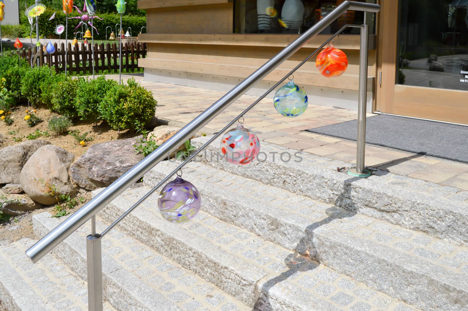 Stainless steel staircase with four handmade glass balls