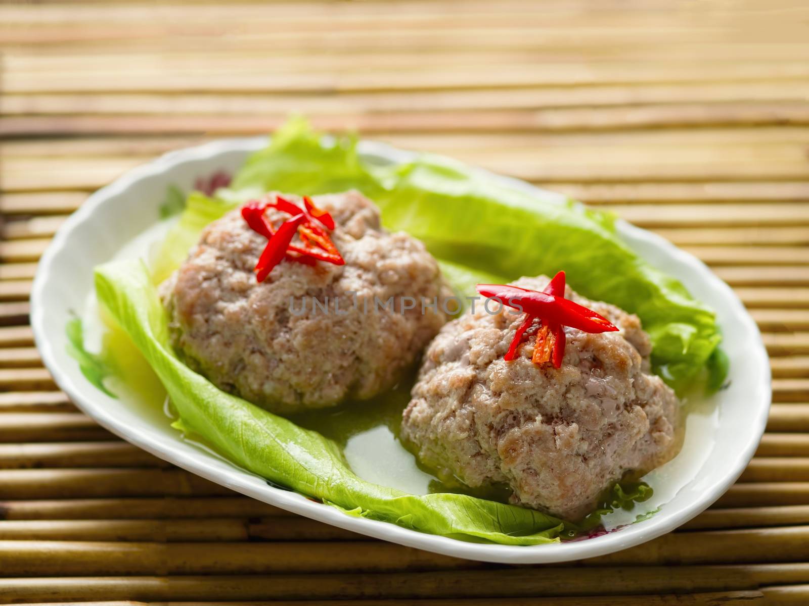 close up of chinese steamed lion head pork meat ball