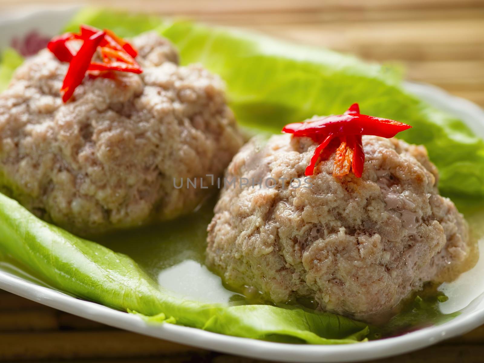 close up of chinese steamed lion head pork meat ball