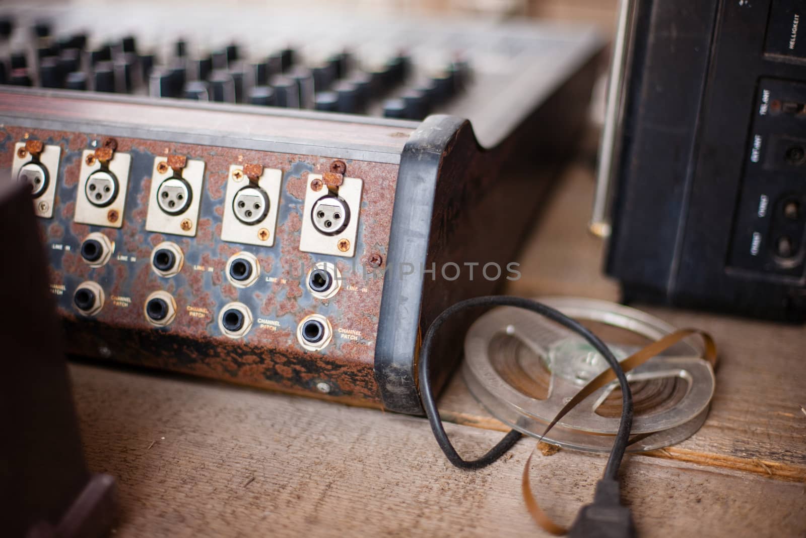 Old unnecessary faulty musical equipment, mixer, controller DJ control. Installation Krakow, Poland