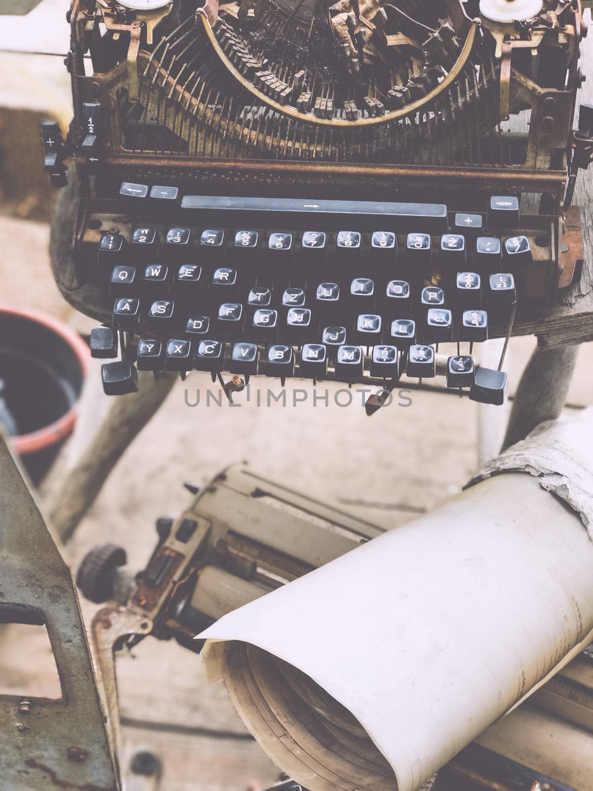 Old retro unnecessary faulty typewriter, professional writer equipment. Installation Krakow, Poland