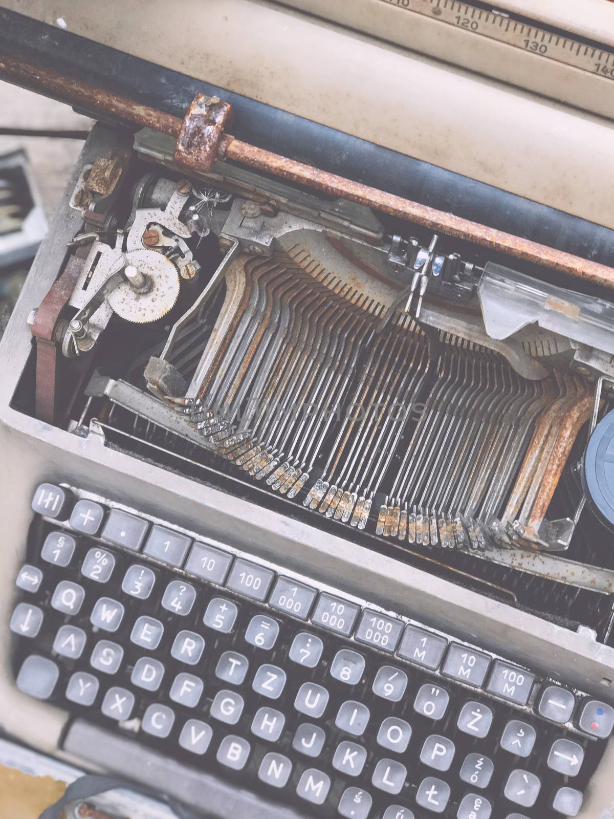 Old retro unnecessary faulty typewriter, professional writer equipment. Installation Krakow, Poland