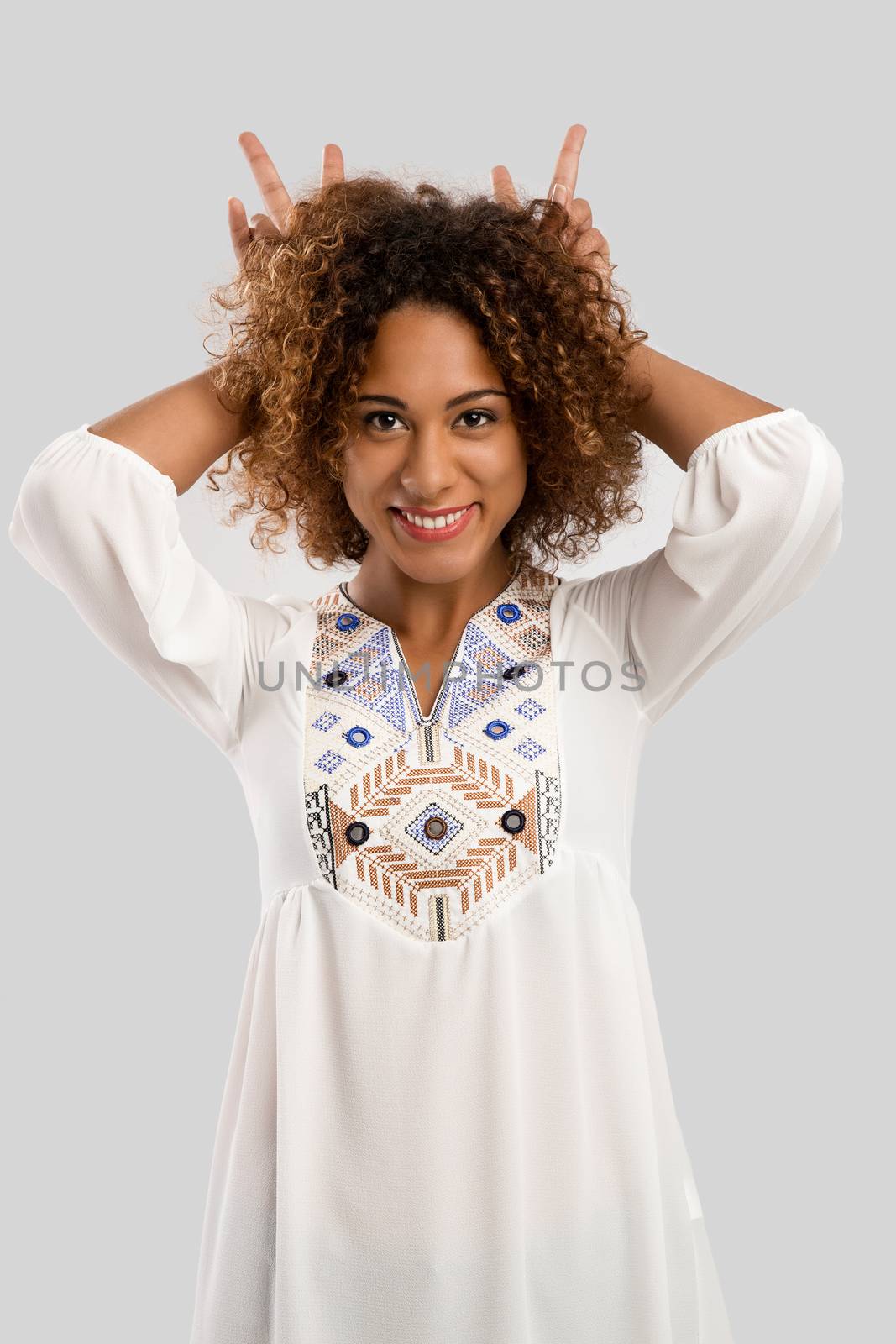 Beautiful African American woman making a silly face