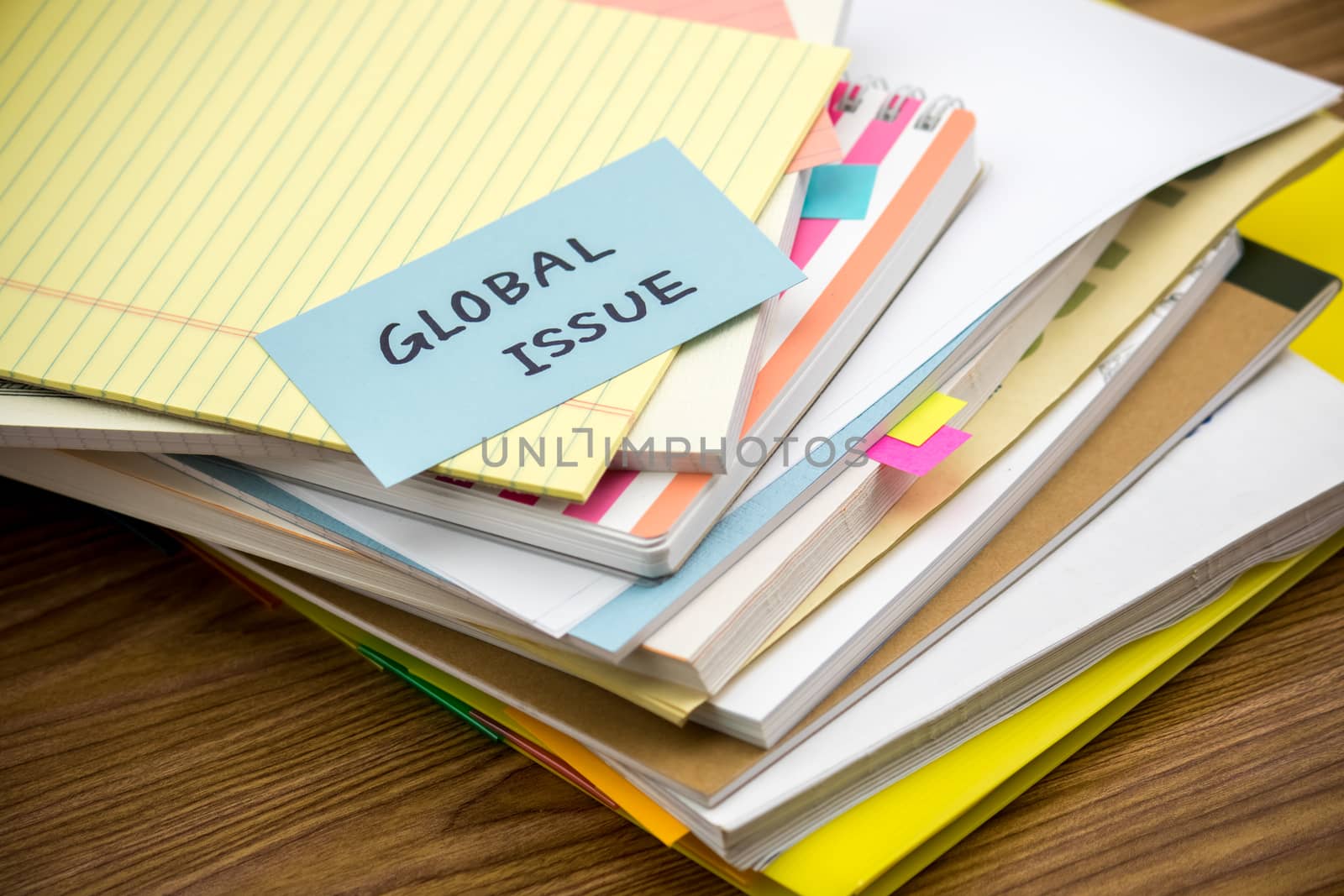 Global Issue; The Pile of Business Documents on the Desk