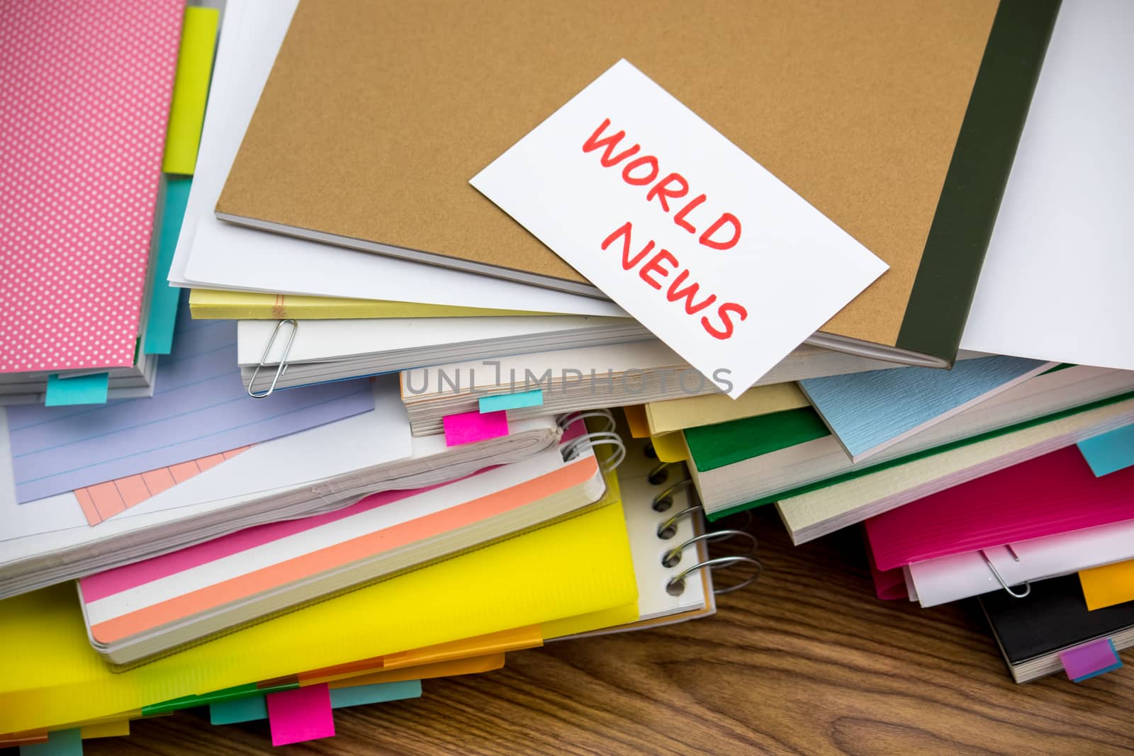 World News; The Pile of Business Documents on the Desk