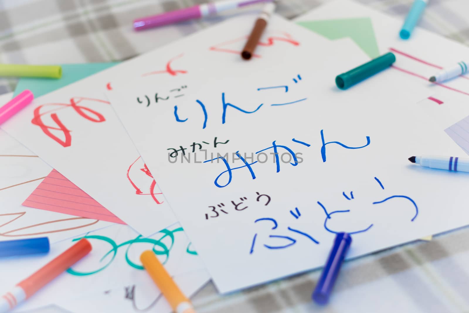 Japanese; Kids Writing Name of the Fruits for Practice (Translation; Apple)