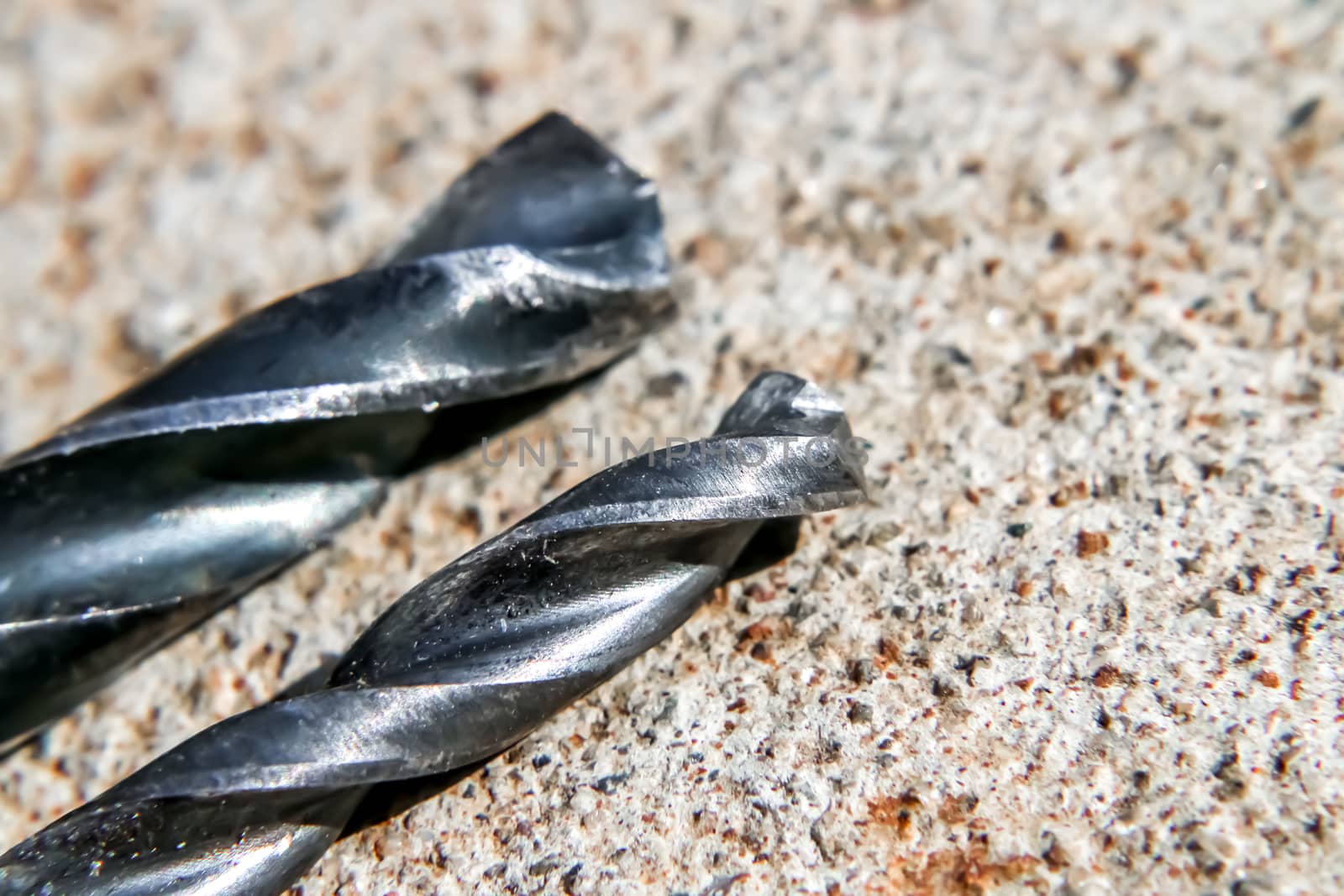 The Isolated Drill Bits with the Gray Ground Background