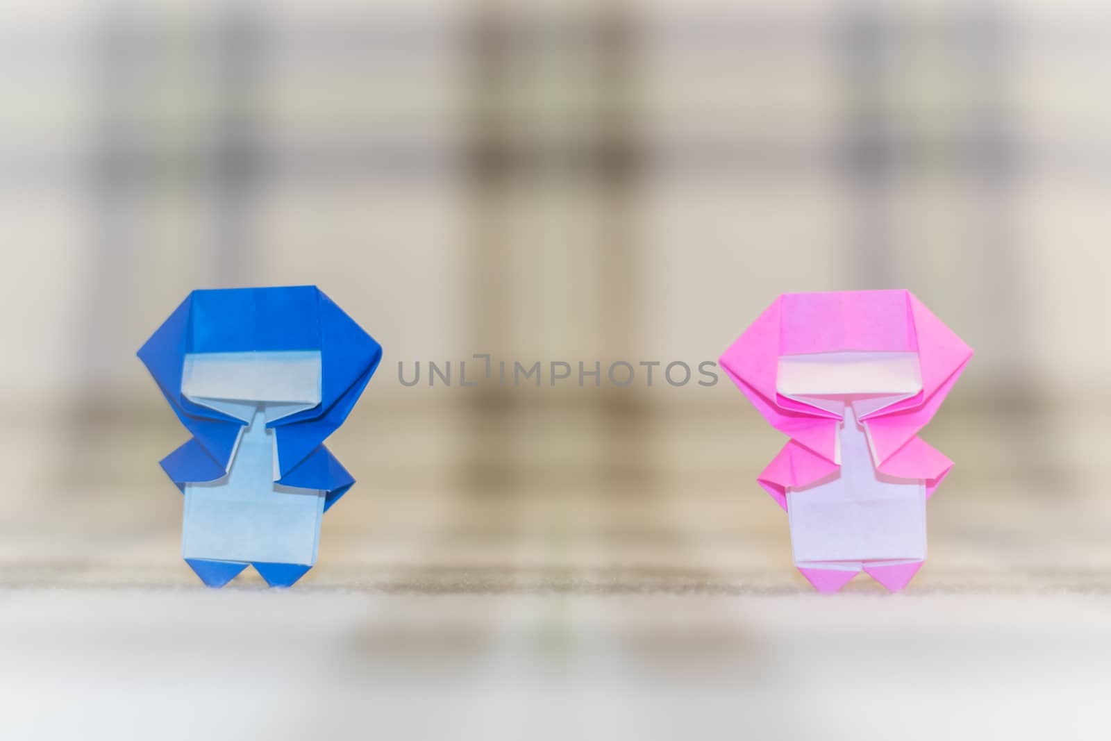 The Handmade Origami Ninja Kids on the Fabric Background