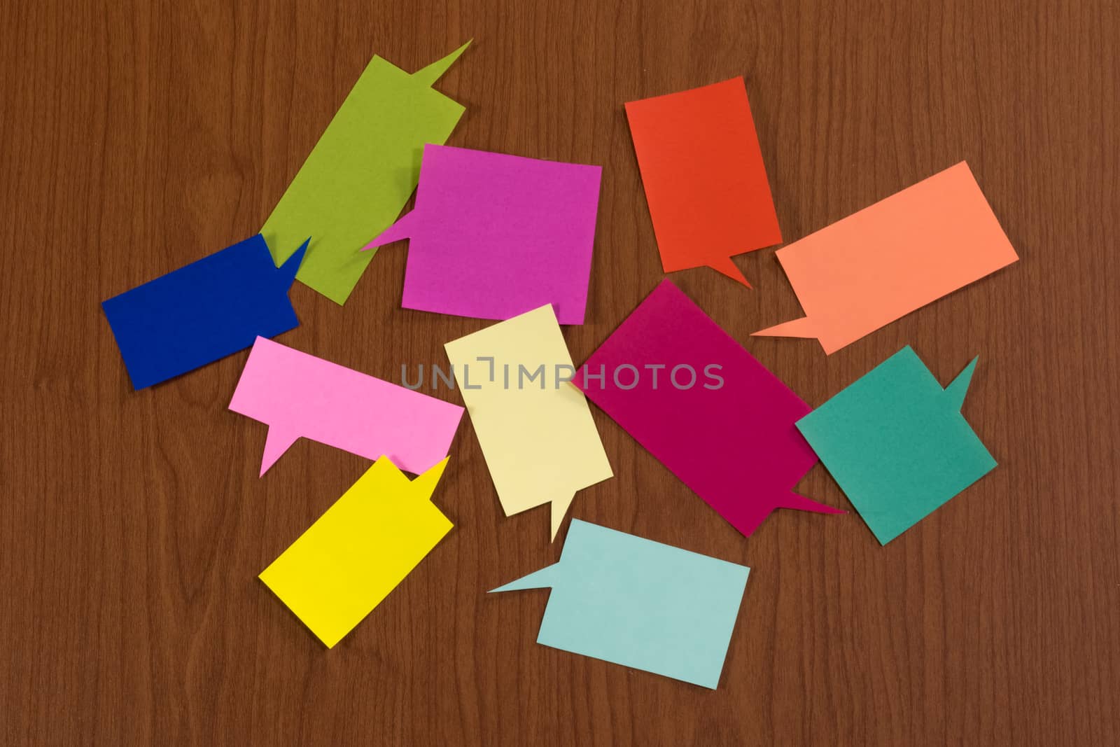 The Handmade Colorful Origami Balloons on the Wooden Background