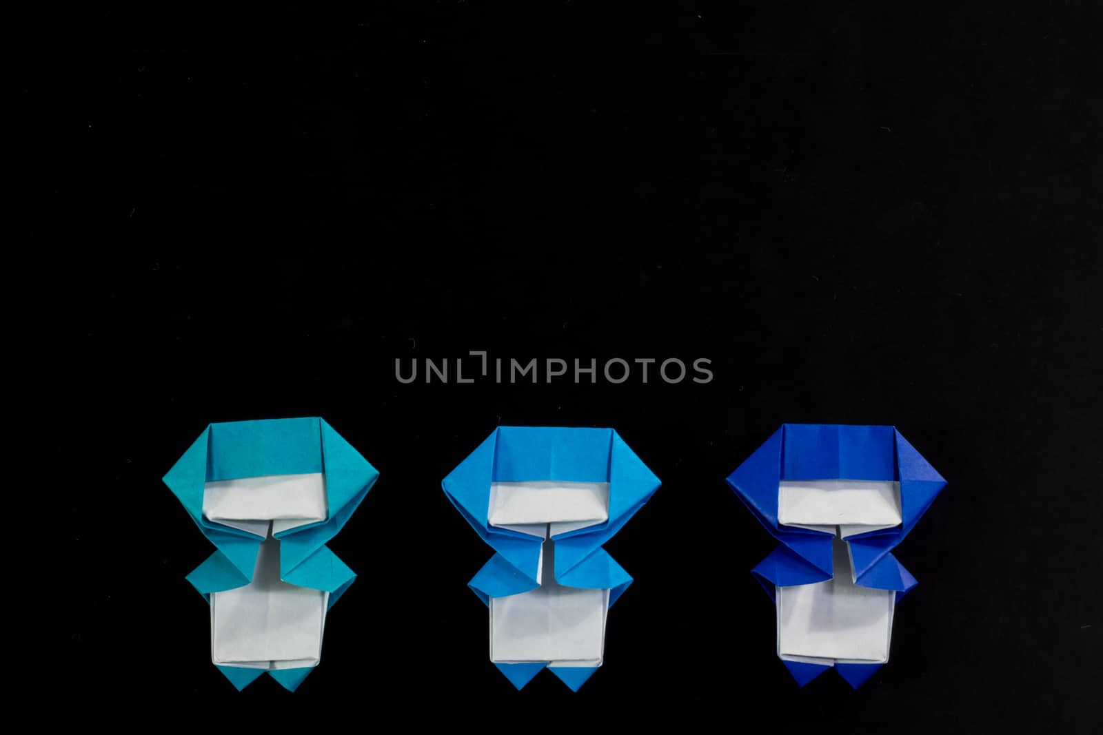 The Handmade Origami Ninja Kids on the Black Background