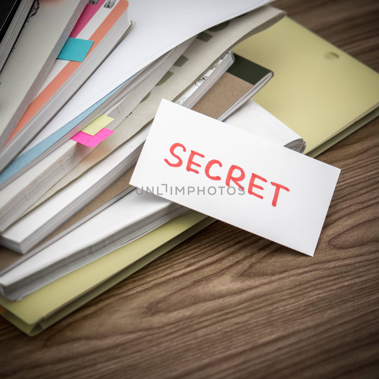 Secret; The Pile of Business Documents on the Desk by EikoTsuttiy