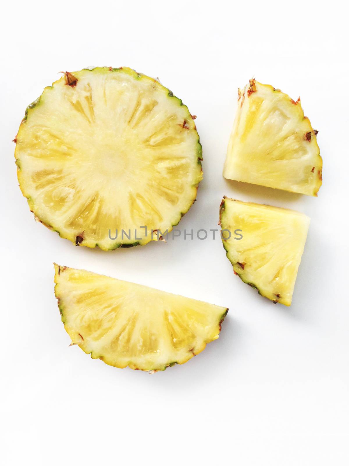 Pineapple slices isolated on white background